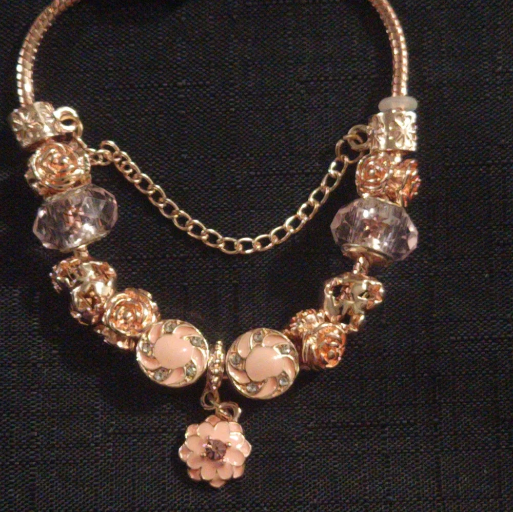 Elegant Rose Gold Bracelet with Pink Accents. ITEM No. 19-145